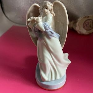 Russ Angel blue and white porcelain with candle receptacle in back